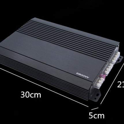 Black amplifier with dimensions labeled on a black background