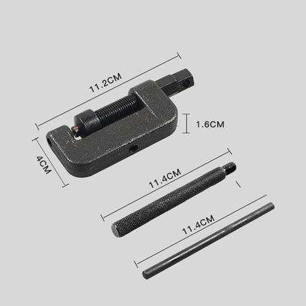 Black metal tool with measurements on a gray background