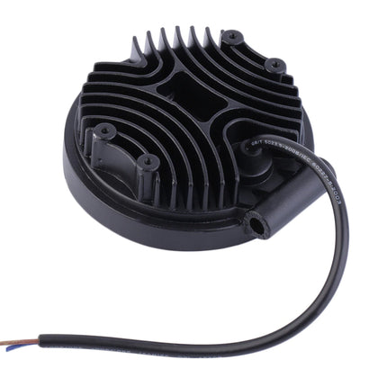 Black electronic component with wires on a white background