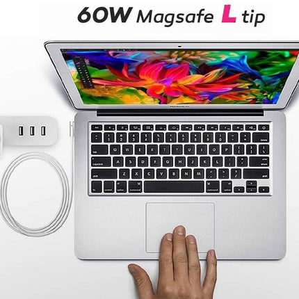 Laptop with 60W Magsafe L tip on a white background