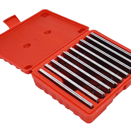 Set of metal rods in a red plastic case on a white background