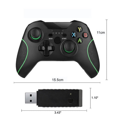 Black wireless game controller with green accents and a USB receiver, shown with dimension labels: 15.5cm by 11cm for the controller and 3.