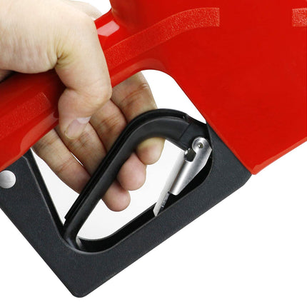 Hand holding a red tool with a black handle on a white background