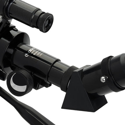 Close-up of a black telescope on a white background