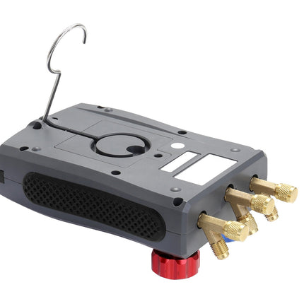 Mechanical device with brass connectors and a red component on a white background