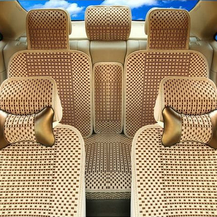 A set of beige and brown woven mesh car seat covers with matching headrest pillows, shown installed inside a vehicle cabin.