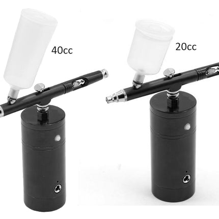 Two black airbrush pens with white spray cups displayed side by side on a white background, labeled 40cc and 20cc.