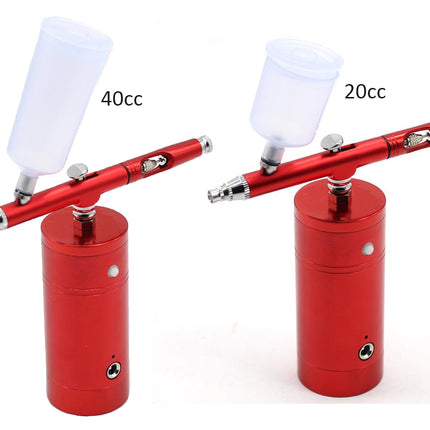 Two red air spray guns with translucent white paint cups displayed side by side on a white background, labeled 40cc and 20cc.