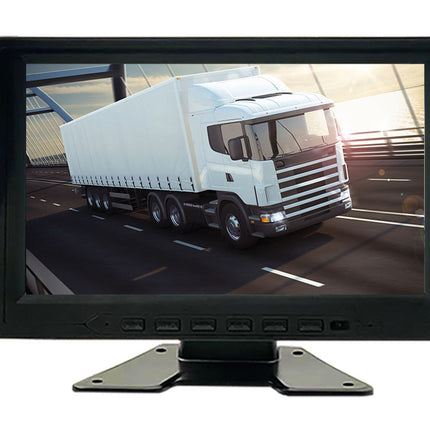 Monitor displaying a truck on a road with a white background