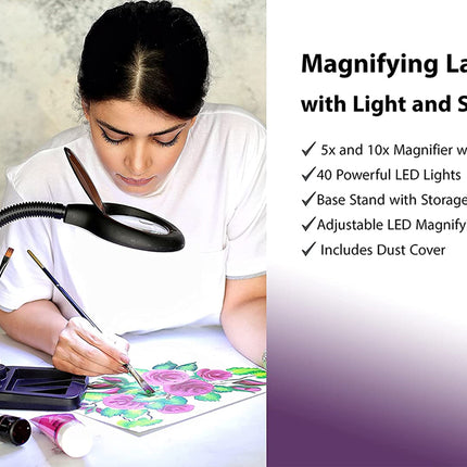Woman using a magnifying lamp with light and stand while working on a craft project.