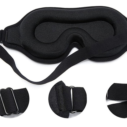 Black sleep mask with adjustable straps on a white background