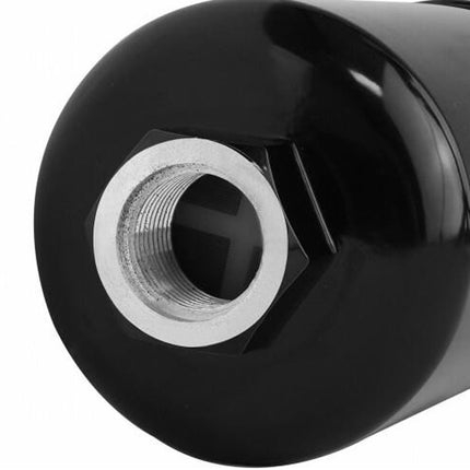 Close-up of a glossy black cylindrical component with a threaded metal opening, shown on a plain white background.
