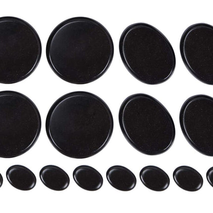 Set of black round stones on a white background