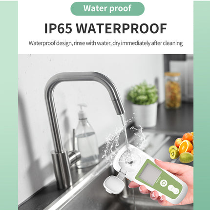 Handheld electronic device with water resistance feature being used over a kitchen sink.