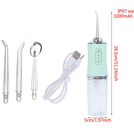Portable water flosser with attachments and charging cable on a white background