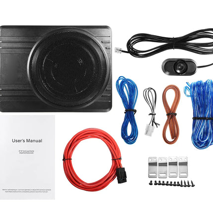 Car audio system components including a subwoofer, cables, and a user's manual on a white background.
