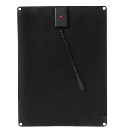Black rectangular electronic panel with a small device attached on a white background
