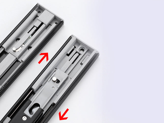 Two metal drawer slides with red arrows indicating features on a white background