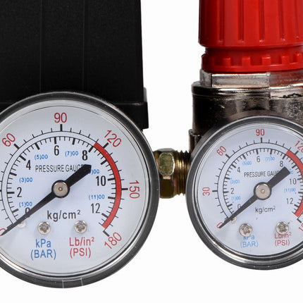 Two pressure gauges on a white background