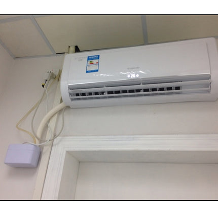 Air conditioner mounted on a wall with visible brand logo