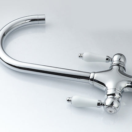 Chrome bathroom faucet on a light gray background
