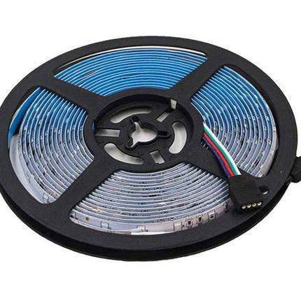 Roll of LED strip light on a white background