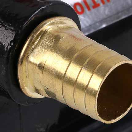 Close-up of a brass fitting on a black background
