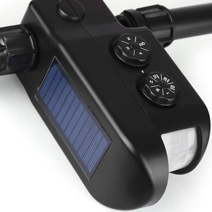 Black electronic device with solar panel and control buttons on a white background