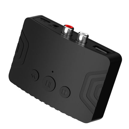 Black audio interface with buttons and connectors on a white background