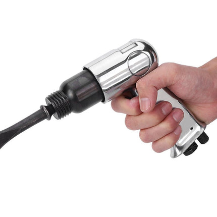 Hand holding a silver and black air gun on a white background