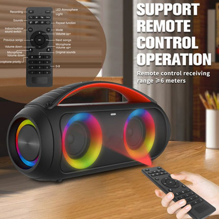 Bluetooth speaker with RGB lighting and remote control on a wooden surface.