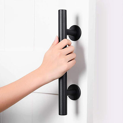 Black door handle being held by a hand on a white background