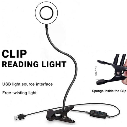 Clip reading light with USB interface and adjustable arm on a white background