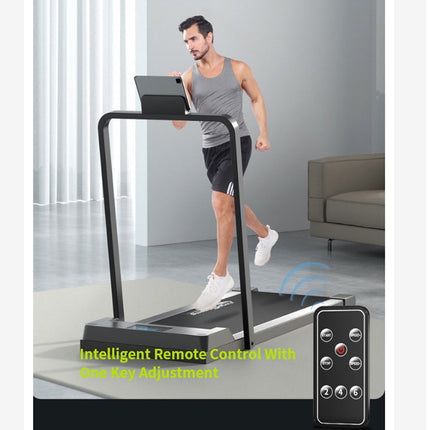 Man using a treadmill with an intelligent remote control in a home setting.