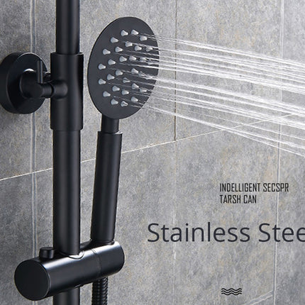 Black shower set with handheld shower head on a tiled wall background