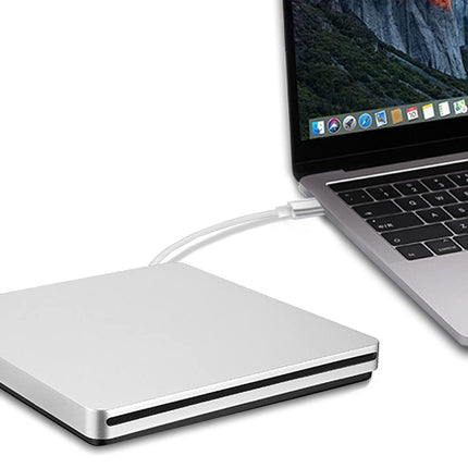 External hard drive connected to a laptop on a white background