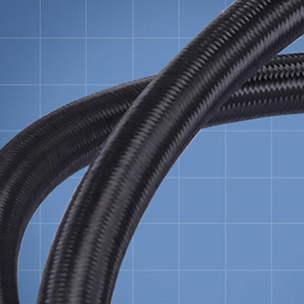 Coiled black cable on a blue grid background