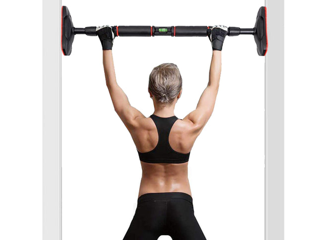 Person lifting a barbell above their head against a white background