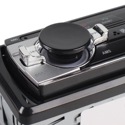 Close-up of a car radio with control knobs and display on a white background