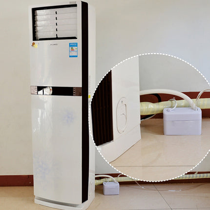 Tall white air conditioner with a close-up of a cable connection on a tiled floor.