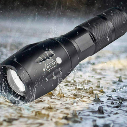 Black flashlight being used in water