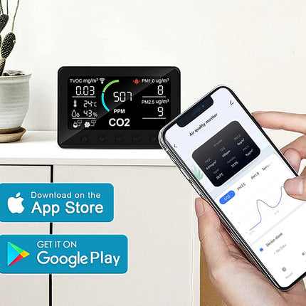 Smart air quality monitor with smartphone app on a white background