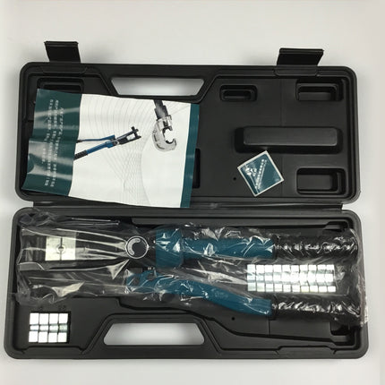 A black plastic tool case opened flat, showing a set of teal and black hand tools wrapped in clear plastic, along with an instruction booklet and a small sticker, on a white background.