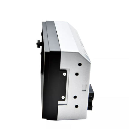 Side view of a metallic object on a white background