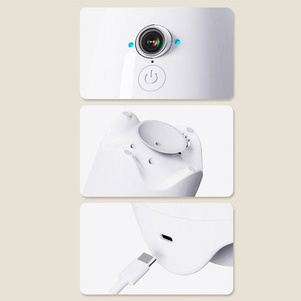 White electronic device with camera and power button on a beige background