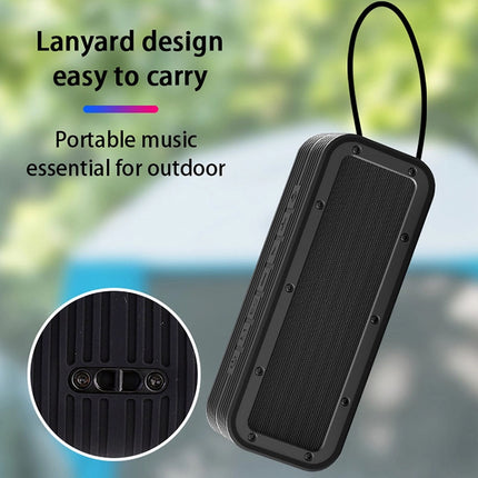 Black portable speaker with lanyard design, suitable for outdoor use.