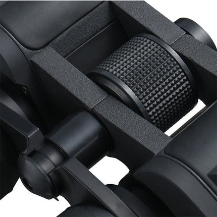 Close-up of a black motorcycle throttle grip with textured design