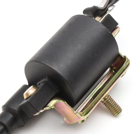Close-up of a black electrical connector with metallic parts on a white background