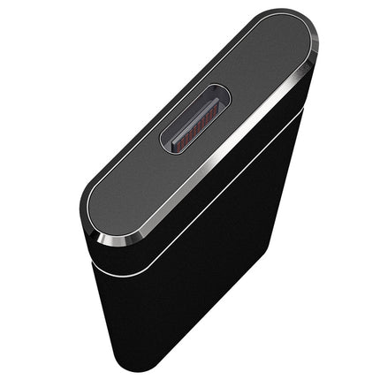 Black electronic device with a metallic accent on a white background