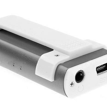 Close-up of a silver and white electronic device on a white background